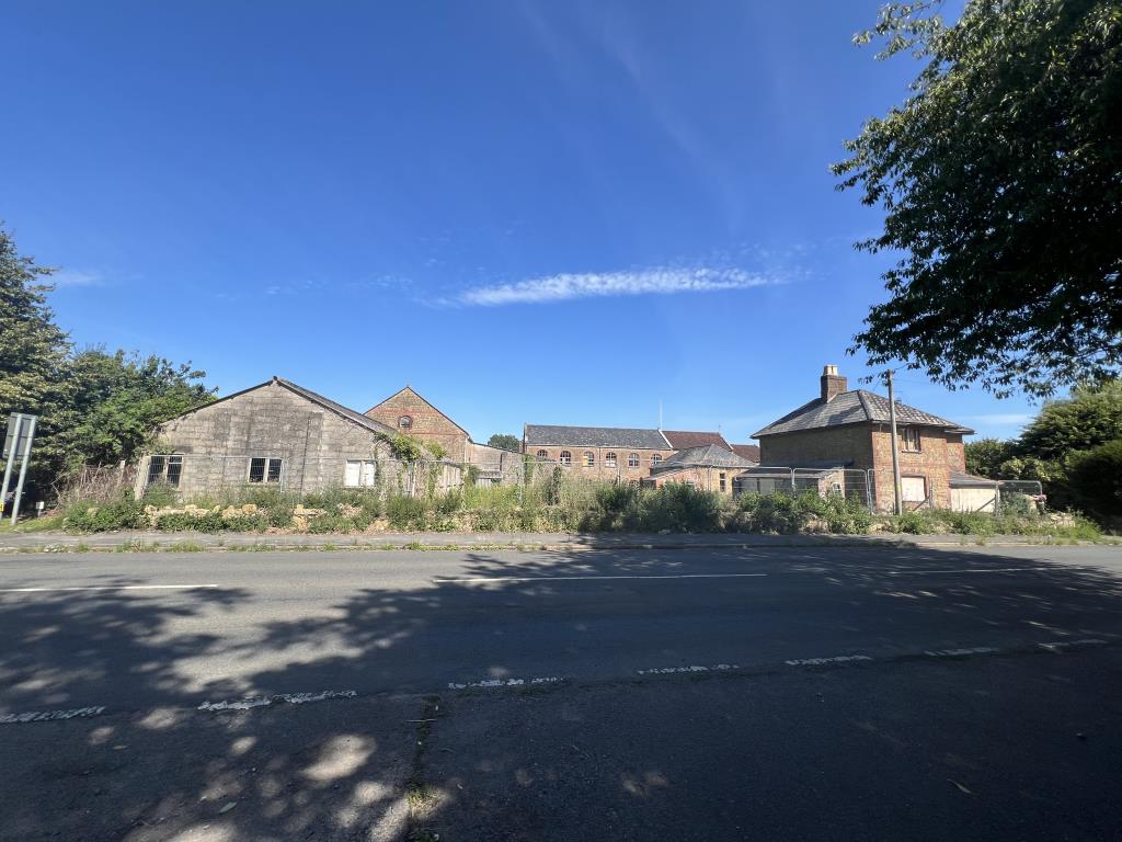Lot: 70 - MULTI-FACETED RESIDENTIAL AND COMMERCIAL SITE WITH POTENTIAL - General view of Dowlish Ford Mill from the road